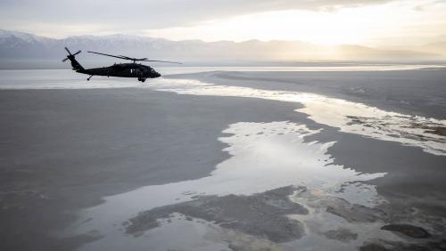 A Blackhawk helicopter flies over the Great Salt Lake as Utah lawmakers take an aerial tour of the Great Salt Lake with the Utah Army National Guard. The group left from the Capitol in Salt Lake City Utah on Tuesday, Feb. 15, 2022.