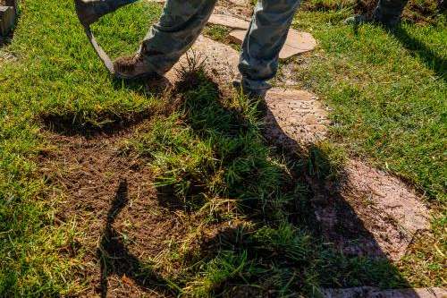 (Trent Nelson | The Salt Lake Tribune) Workers with Foxtail Turf remove the grass from Patricia Council's North Las Vegas yard, replacing it with artificial turf on Thursday, Sept. 29, 2022.