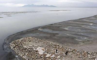 Tourists visit the Great Salt Lake on Nov. 19, 2021. The lake officially hit its lowest levels ever in October 2021. (Laura Seitz, Deseret News)