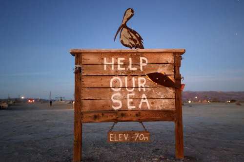 A sign by artist Keith Jones is one of many art installations on display on the shores of the Salton Sea in Bombay Beach, Calif., on Friday, Dec. 15, 2023. Kristin Murphy, Deseret News
