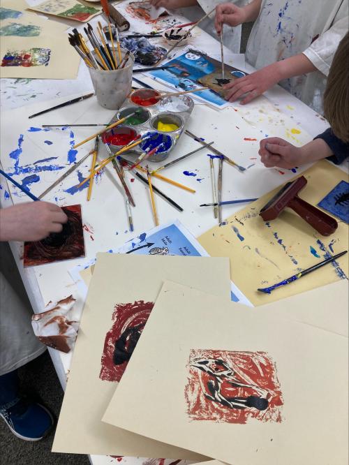 In this photo from spring 2024, students from Wasatch Elementary in Salt Lake City work on an art project about the Great Salt Lake with Utah Poet Laureate Lisa Bickmore. (Photo courtesy Lisa Bickmore)