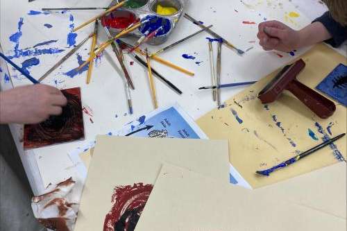 In this photo from spring 2024, students from Wasatch Elementary in Salt Lake City work on an art project about the Great Salt Lake with Utah Poet Laureate Lisa Bickmore. (Photo courtesy Lisa Bickmore)