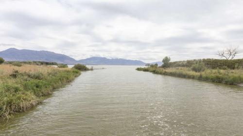 Utah Lake as seen from the Utah Lake pump house in Saratoga Springs on Monday. About 10,000 acre-feet of water from the lake will be sent to the Great Salt Lake via the Jordan River over the next month. Utah Lake as seen from the Utah Lake pump house in Saratoga Springs on Monday. About 10,000 acre-feet of water from the lake will be sent to the Great Salt Lake via the Jordan River over the next month. (Brice Tucker, Deseret News)