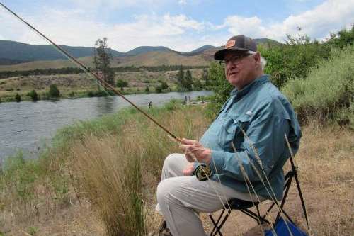 Legendary fly fisherman Emmett Heath at Little Hole along the Green River in Utah. (Sheri Quinn/UPR)