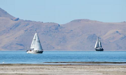 Two sailboats move across the water at the Great Salt Lake, near Magna, on Sept. 24, 2024. Scott G Winterton, Deseret News