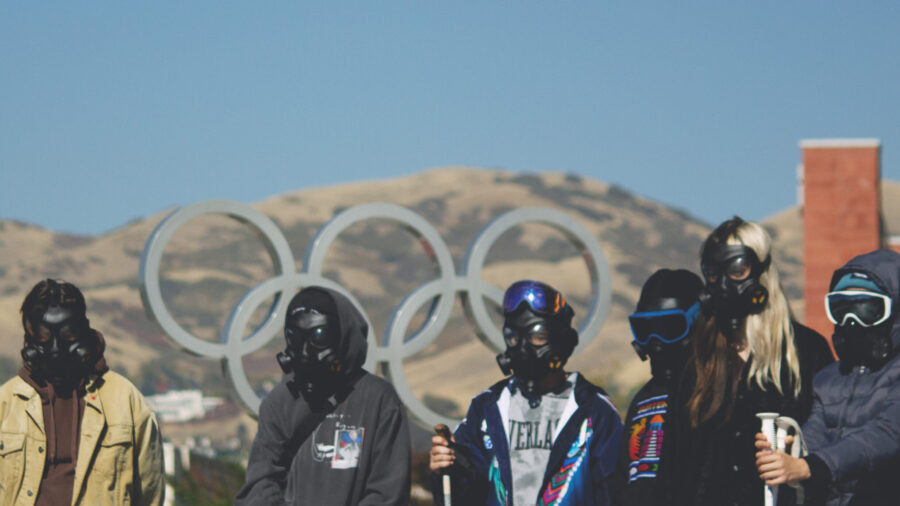 Utah teens wear gas masks and ski goggles at Olympic Cauldron Park during a demonstration in support of Great Salt Lake on Saturday, Oct. 26, 2024. The teens want to see Utah legislators do more to protect the lake. (Topaz Henderson/Utah Youth Environmental Solutions)