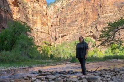 Autumn Gillard stands on the banks of the Virgin River in Zion National Park, Utah, Oct. 16, 2024. Photo by Sheldon Demke, St. George News 