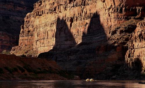 A group of river experts, scientists, water rights lawyers, tribal representatives, non-profit representatives, philanthropists and river guides raft down Cataract Canyon on the Colorado River with the Returning Rapids Project on Sunday, Sept. 22, 2024. Kristin Murphy, Deseret News 