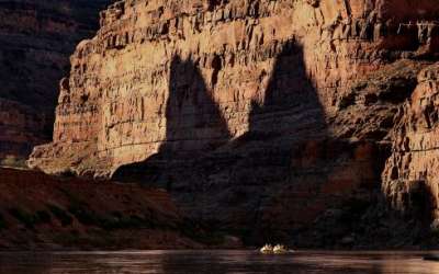 A group of river experts, scientists, water rights lawyers, tribal representatives, non-profit representatives, philanthropists and river guides raft down Cataract Canyon on the Colorado River with the Returning Rapids Project on Sunday, Sept. 22, 2024. Kristin Murphy, Deseret News 