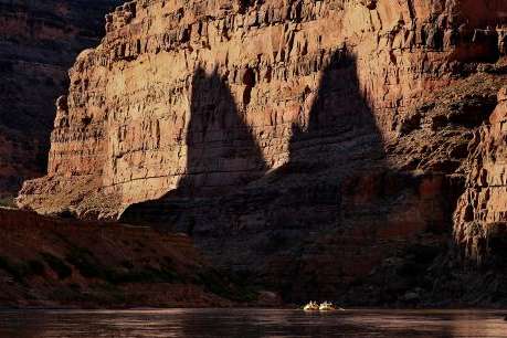 A group of river experts, scientists, water rights lawyers, tribal representatives, non-profit representatives, philanthropists and river guides raft down Cataract Canyon on the Colorado River with the Returning Rapids Project on Sunday, Sept. 22, 2024. Kristin Murphy, Deseret News 