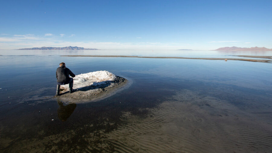 FILE --Mark Milligan, with the Utah Geological Survey, takes a photo of a mound formed by the mineral mirabilite on the shores of the Great Salt Lake on Tuesday, Jan. 7, 2020. (Scott G. Winterton/Deseret News)