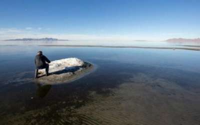 File -- Mark Milligan, with the Utah Geological Survey, takes a photo of a mound formed by the mineral mirabilite on the shores of the Great Salt Lake on Tuesday, Jan. 7, 2020. (Scott G. Winterton/Deseret News)