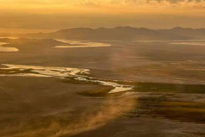 Dust blows across the dry lakebed of the Great Salt Lake on Aug. 12, 2022. The leader of a group advocating for air quality monitors to study Great Salt Lake dust says he's disappointed the project may miss out on funding in this year's budget. (Spenser Heaps, Deseret News) 