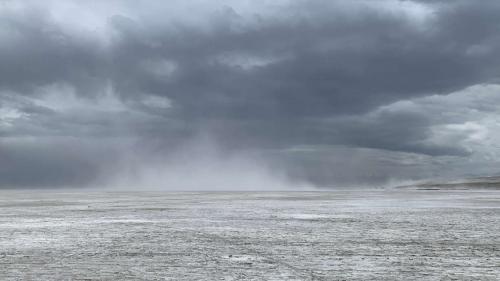 Dust flies off the Great Salt Lake on Sunday. Environmental groups warn that despite the increase this spring, the lake is still prone to dust storms. (Carmen Valdez/Healthy Environment Alliance of Utah)