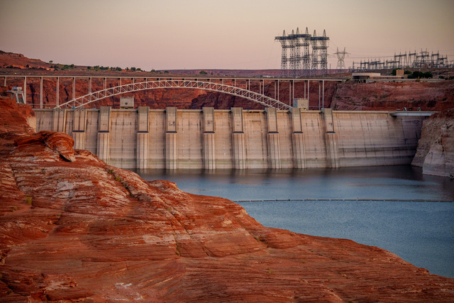 (Trent Nelson  |  The Salt Lake Tribune) Glen Canyon Dam and high-voltage transmission towers in Page, Ariz. on Tuesday, May 20, 2025.