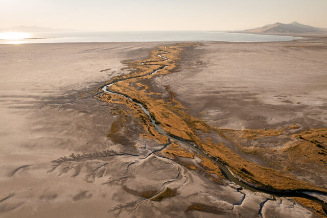 Lee Creek flows through mudflats into the Great Salt Lake near Magna on Tuesday, Aug. 5, 2025. (Photo by Spenser Heaps for Utah News Dispatch)