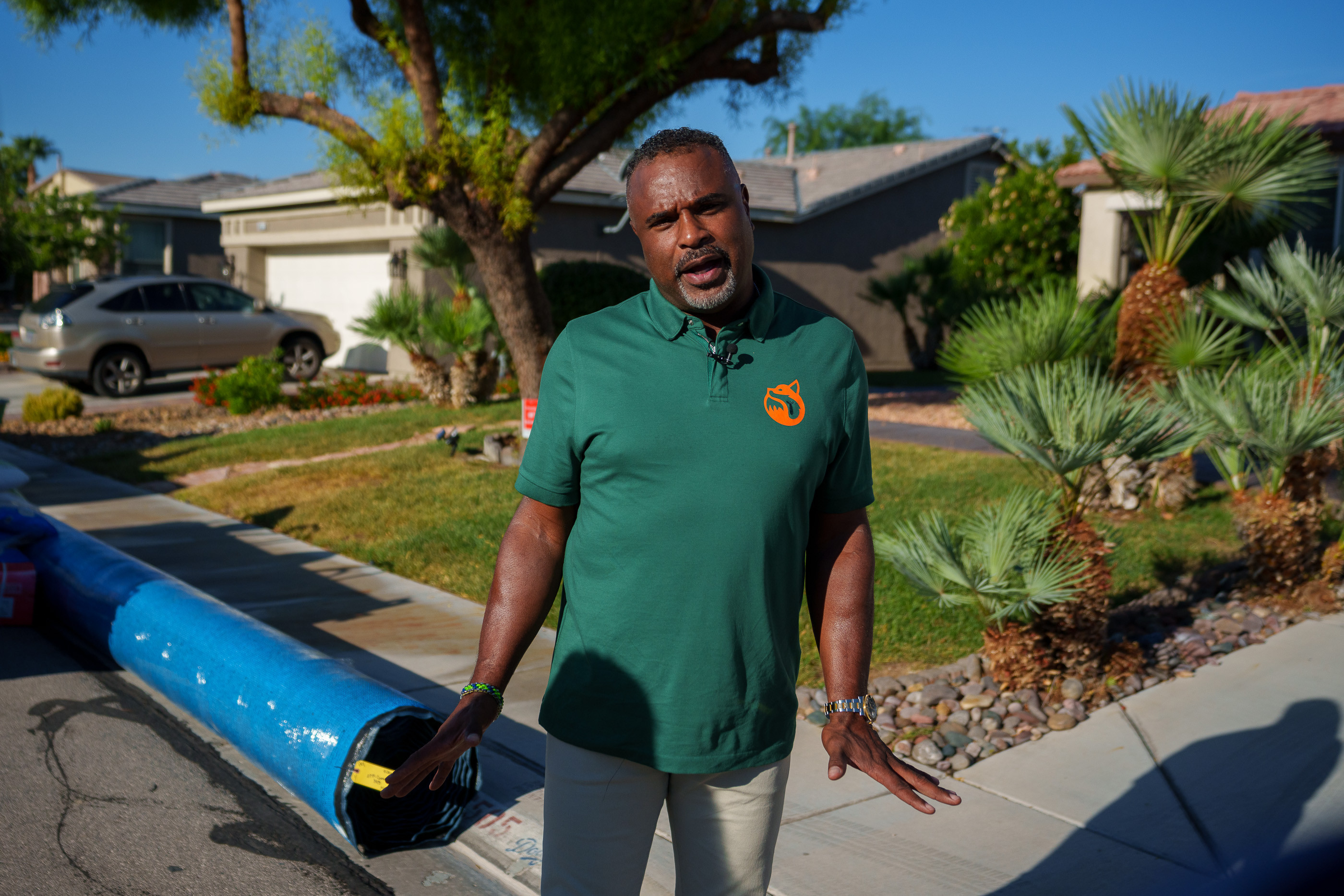 (Trent Nelson  |  The Salt Lake Tribune) Michael Nelson, with Foxtail Turf, talks turf before a crew removed the grass from Patricia Council's North Las Vegas yard and reaplced it with artificial turf on Thursday, Sept. 29, 2022.
